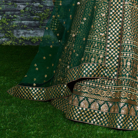 Green raw silk blouse adorned with gold sequin embroidery lehenga choli for women