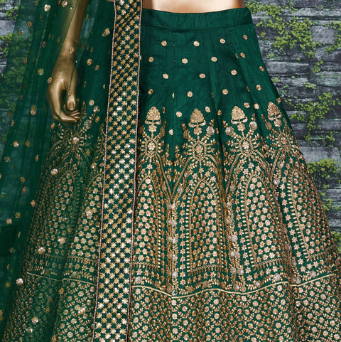 Green raw silk blouse adorned with gold sequin embroidery lehenga choli for women