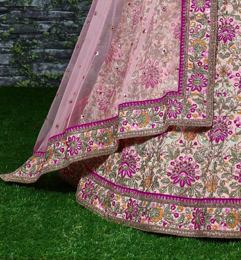 Pink Make you're ethnic look more stylish & classic with this gleaming peach-colored taffeta silk lehenga choli