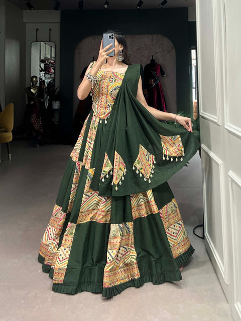 Green phenomenal spirit of our navratri lehenga with printed design in your garba collection to make imperial impressions on garba night