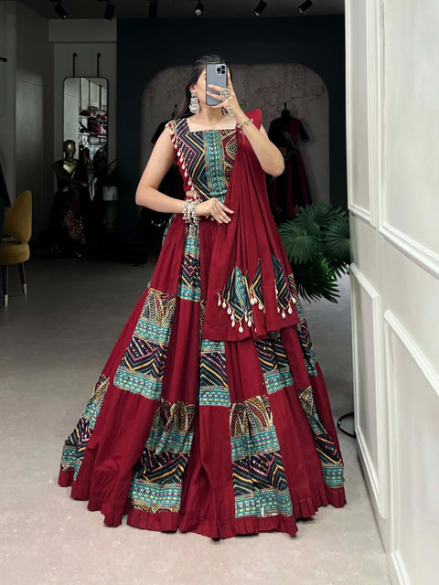 red phenomenal spirit of our navratri lehenga with printed design in your garba collection to make imperial impressions on garba night