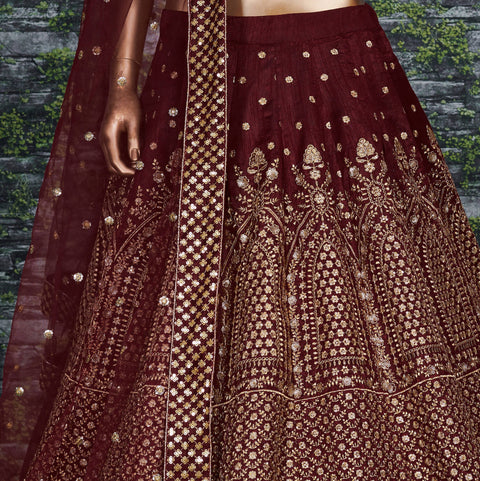 Maroon raw silk blouse adorned with gold sequin embroidery. lehenga choli for women