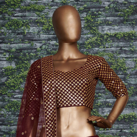 Maroon raw silk blouse adorned with gold sequin embroidery. lehenga choli for women