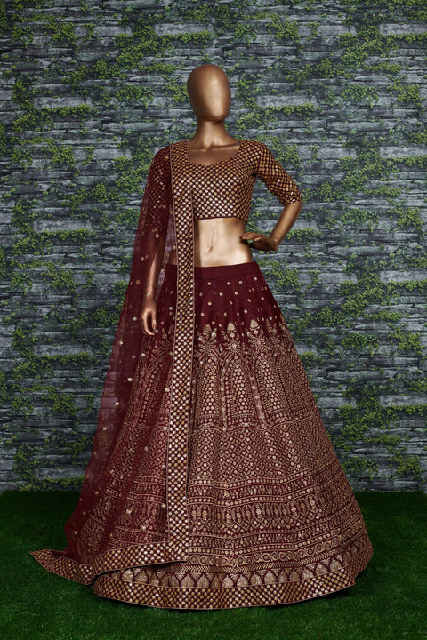 Maroon raw silk blouse adorned with gold sequin embroidery. lehenga choli for women