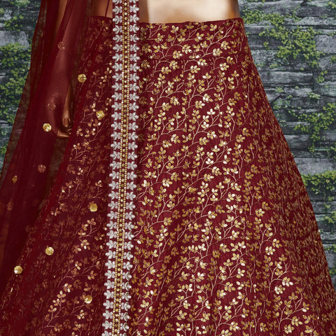 maroon Raw silk lehenga with golden zari embroidered in vine pattern accentuated with golden sequins all over lehenga choli for women