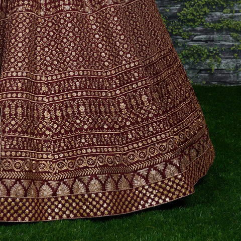 Maroon raw silk blouse adorned with gold sequin embroidery. lehenga choli for women