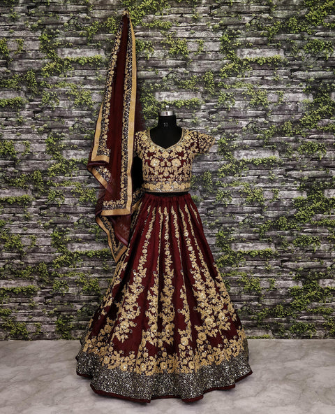 Give yourself an unique look by wearing this exquisite maroon color silk lehenga set.