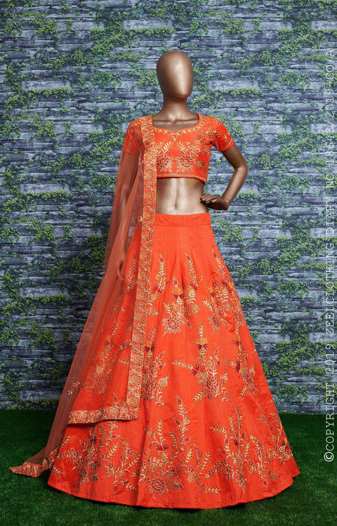 Orange Adorn a simple yet elegant charm with this ensemble in an this dark orange lehenga choli for women