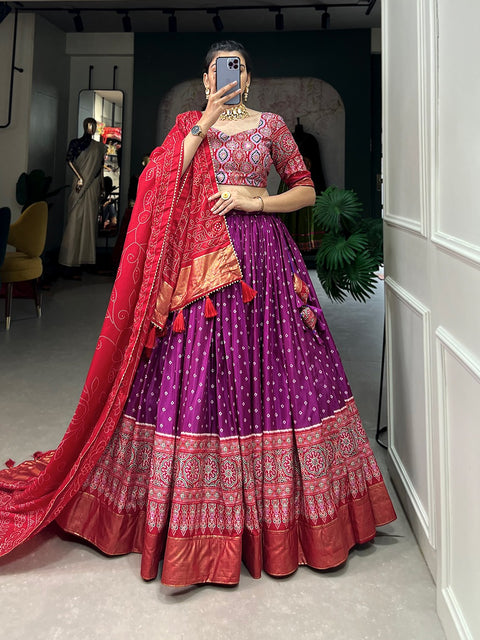 Purple timeless bandhani print chaniya choli showcases intricate ajrakh print and foil lacework, combining elegance and tradition in a stunning ensemble for Function