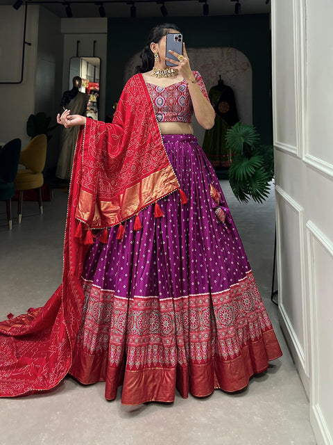 Purple timeless bandhani print chaniya choli showcases intricate ajrakh print and foil lacework, combining elegance and tradition in a stunning ensemble for Function