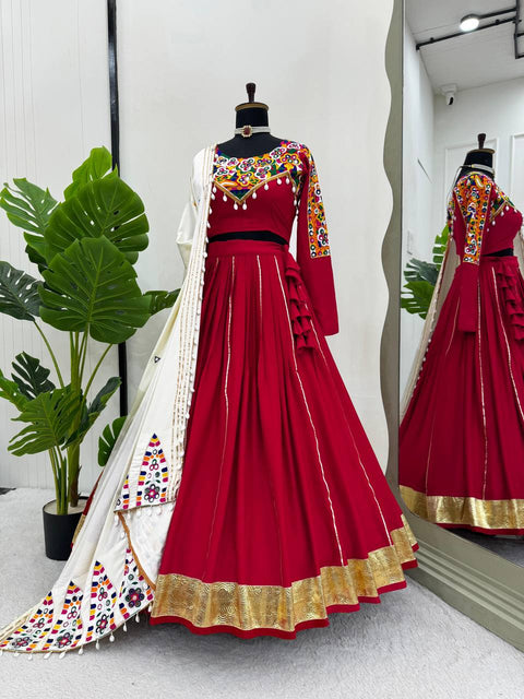 Red For your essential part of gujarati collection we are presenting navratri attire lehenga choli