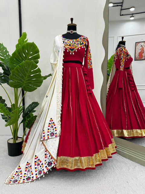 Red For your essential part of gujarati collection we are presenting navratri attire lehenga choli