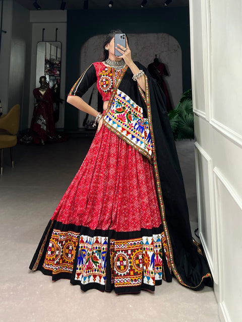 Red masterpiece of garba choli embellishes with gamthi work and mirror work for women