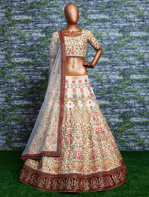 Elegant Make you're ethnic look more stylish & classic with this gleaming Cream-colored taffeta silk lehenga choli