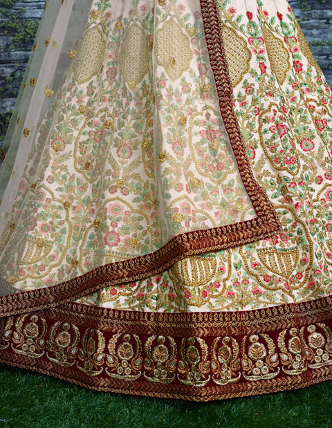 Elegant Make you're ethnic look more stylish & classic with this gleaming Cream-colored taffeta silk lehenga choli